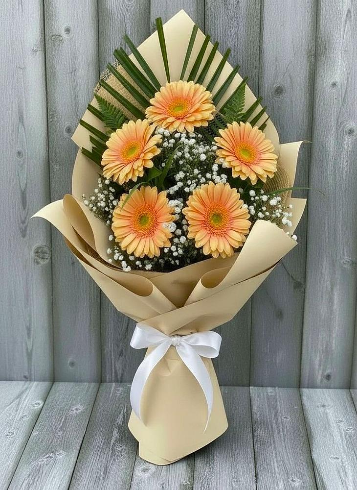 Букет цветов из: Герберы в Наушки